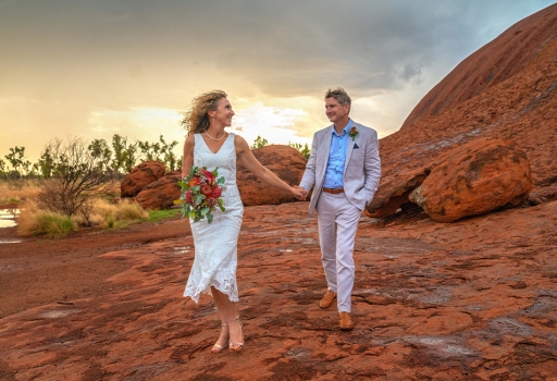 Rain, hail or shine! This stormy day Uluru wedding had all three!